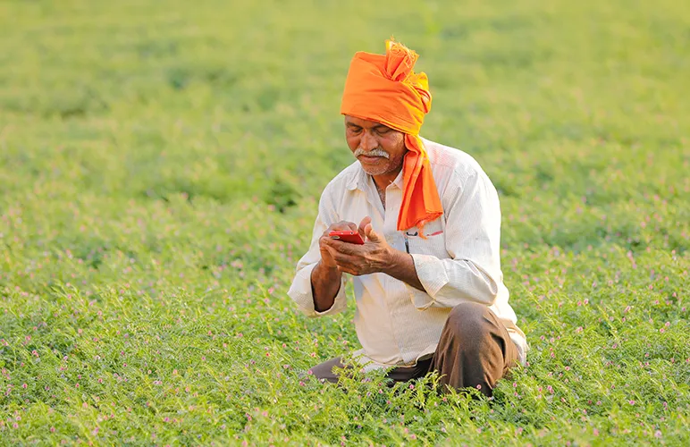 Farmer on his phone