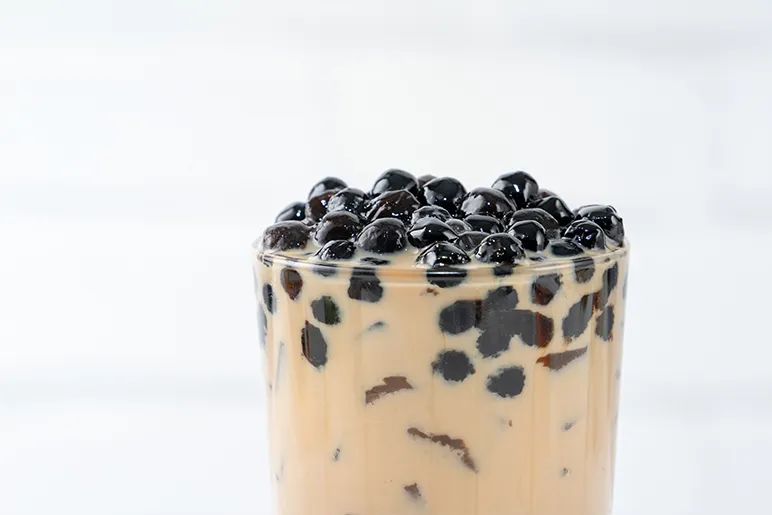 a container of bubble tea 