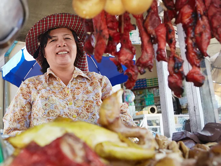 Woman selling at Asian street stall