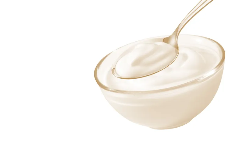 Illustration of yoghurt being spooned from a bowl