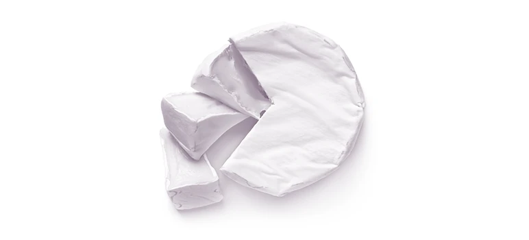 Wheel of cheese with three slices cut out